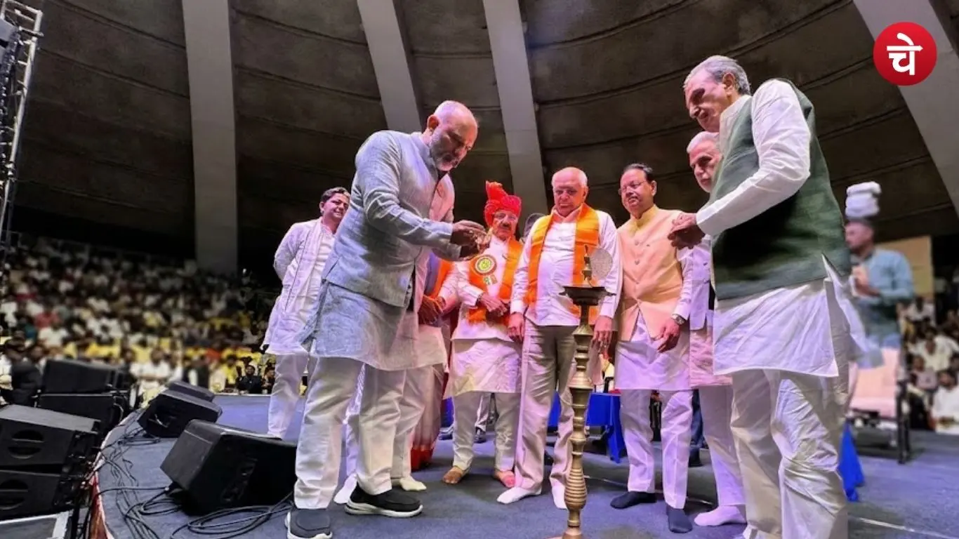 Bhupendra Patel and other leaders lighting a lamp at a gathering of the Gurjar community in Delhi